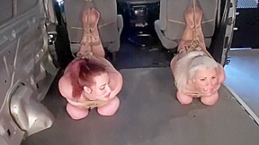 2 Woman Bound and Gagged in the back of a Truck
