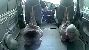 2 Woman Bound and Gagged in the back of a Truck