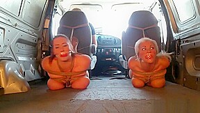 2 Woman Bound and Gagged in the back of a Truck