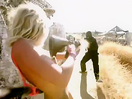 3 nude fighting with gun