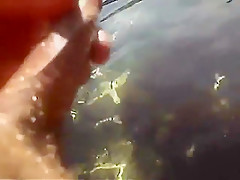 A hot day spent naked at the beach cums to a horny end