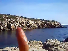 A hot day spent naked at the beach cums to a horny end