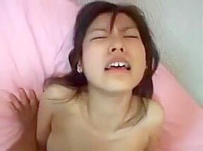 Adorable Oriental teen 18+ Lies On Her Back And Enjoys An Inten