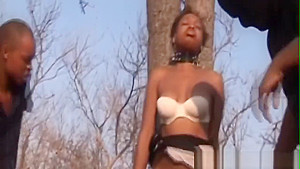 African Babe Gets Spanked Into Having Sex Tied Up To A Tree