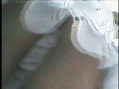 Amateur upskirt thong video of a tempting girl in fishnet