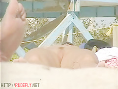 Amazing nudist hotties bathing in sun at the beach