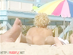Amazing nudist hotties bathing in sun at the beach