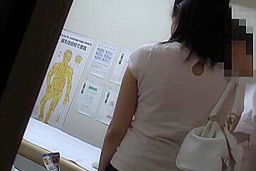 An Asian girl receives some good massage and pussy fingering in this medical tube