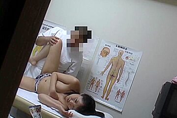 An Asian girl receives some good massage and pussy fingering in this medical tube