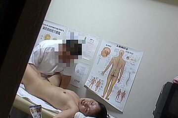 An Asian girl receives some good massage and pussy fingering in this medical tube