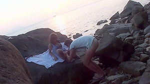 Anne in sex on the beach with a nice-looking babe
