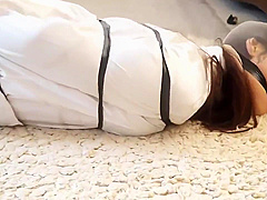 Asian Girl Hooded And Taped Up