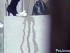 Asian Urinates In Alley