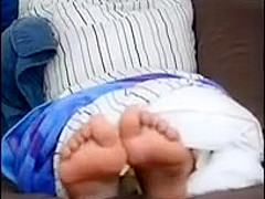 Asian girl gets her sexy feet tickled!