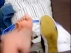 Asian girl gets her sexy feet tickled!