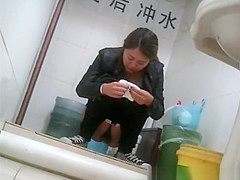 Asian girl in tight jeans pants peeing