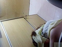 Asian lifts her skirt and take a pee