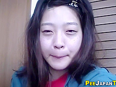 Asian teen 18+ Urinates In Plastic Glass