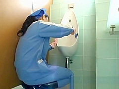 Asian toilet attendant cleans wrong part1