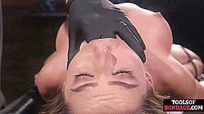 BDSM babe toyed by master with BDSM tools till orgasm