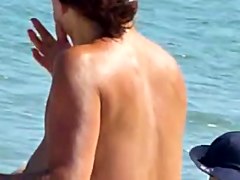Beach 04 - Topless chicks puts sun spunk on face