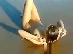 Beautiful Naked Girl At The Beach