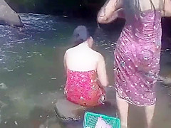 Beautiful girls having bath outdoor