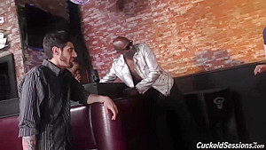 Bella Jane is kneeling in front of many horny guys and sucking their dicks, like a pro