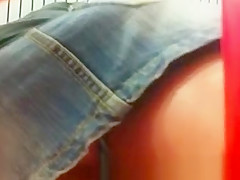 Blonde in short denim skirt
