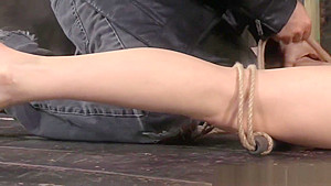 Bondage fetish gets hogtied on the floor