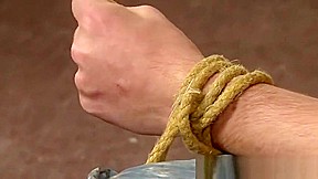 Bound Jonny Parker cock stroked by old dom Sebastian Kane