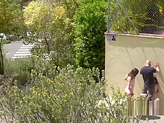 Brunette beauty suspended and whipped outdoor