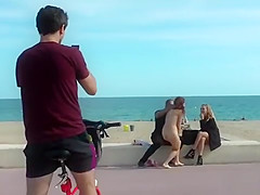 Brunette gets group facial in public