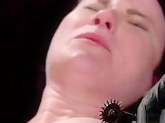 Brunette immobilized in extreme device