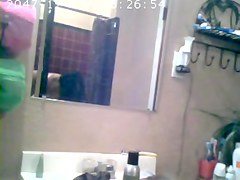 Brunette showing Tits in Bathroom