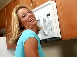 Busty Anilos Brenda James rides a dong on kitchen floor