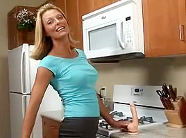 Busty Anilos Brenda James rides a dong on kitchen floor