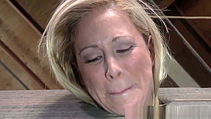 Busty MILF toyed during kinky bondage