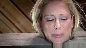 Busty MILF toyed during kinky bondage
