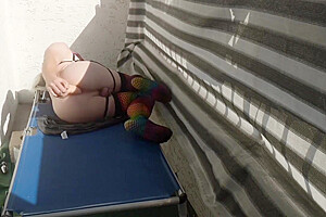 Caged Sissy Plays With Her Dildo On Public Balcony