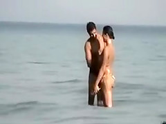 Camera at Public Beach Films Busty Girlfriend Cleaning Up