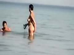 Camera at Public Beach Films Busty Girlfriend Cleaning Up