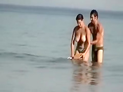 Camera at Public Beach Films Busty Girlfriend Cleaning Up
