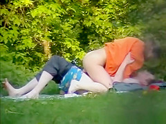 Chick rides dick in public park