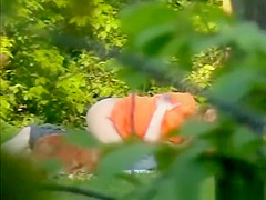 Chick rides dick in public park