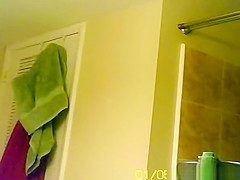 Chick taking care of hygine after shower