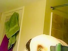 Chick taking care of hygine after shower