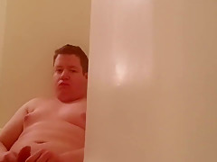 Chubby boy pisses and cums