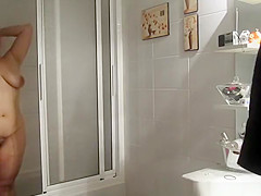 Chubby busty wife in bathroom drying