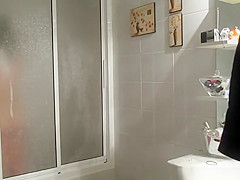 Chubby busty wife in bathroom drying